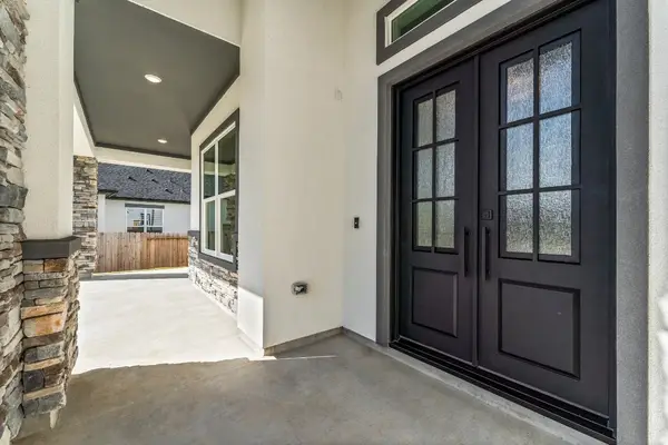 23315 Vista De Tres Lagos Drive, Spring, TX 77389