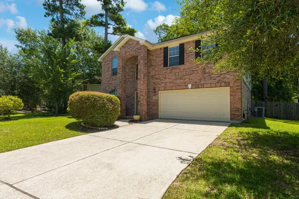 50 N Spinning Wheel Circle, The Woodlands, TX 77382