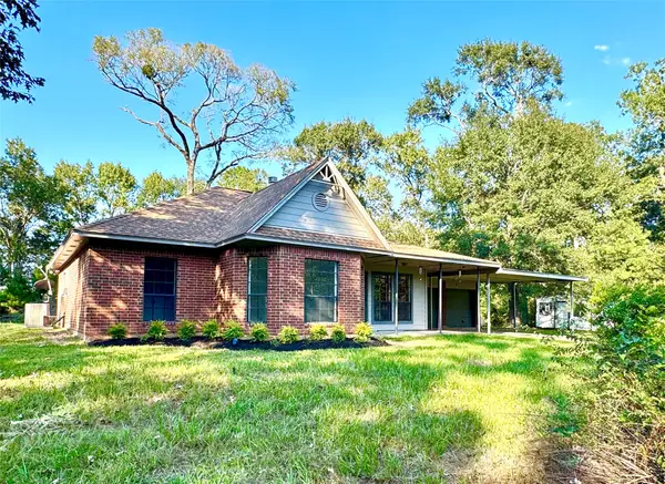 6059 Woodland Lakes Loop, Willis, TX 77378