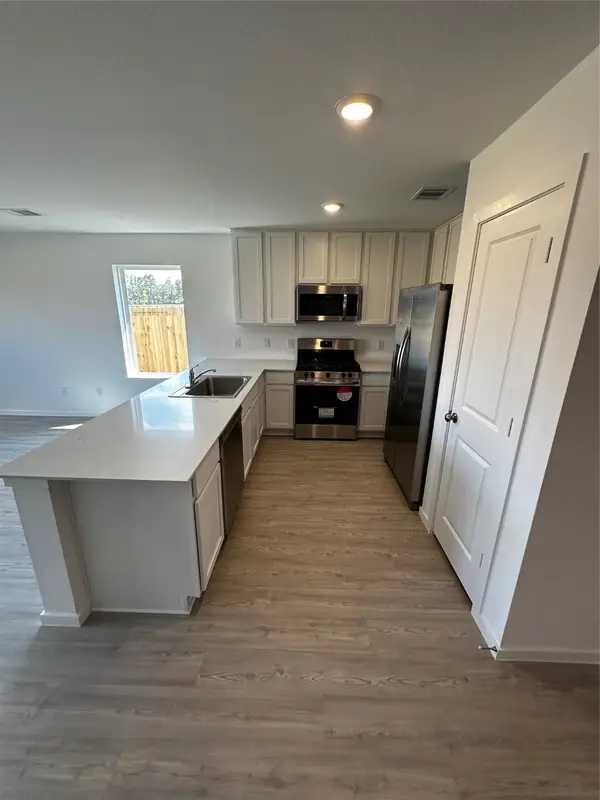 18902 Kingham Woods Court, Conroe, TX 77306