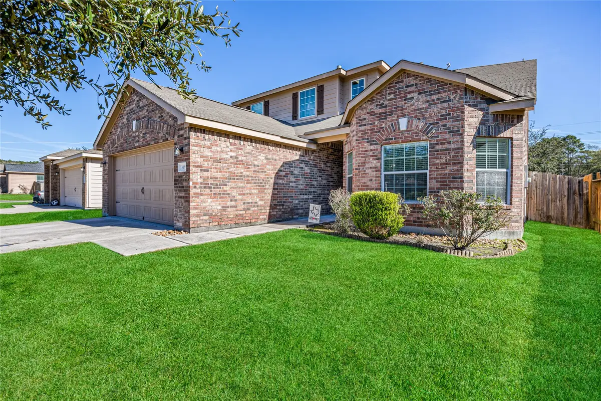 319 Falling Pine Drive, Conroe, TX 77304 - Image #1
