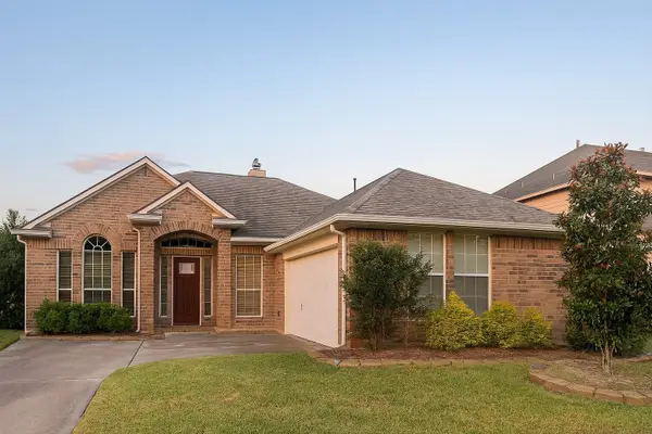 12034 N Brenton Knoll Drive, Tomball, TX 77375