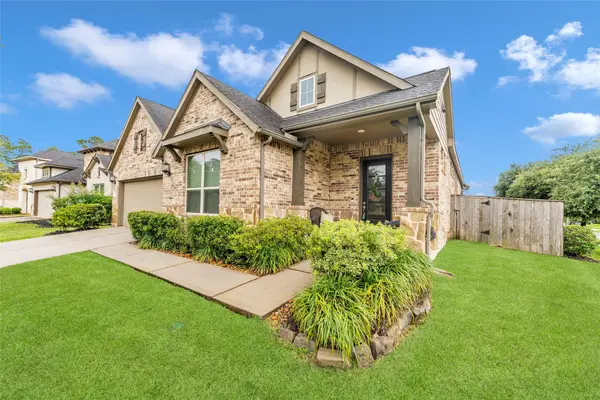 561 Rolling Brook Lane, Pinehurst, TX 77362