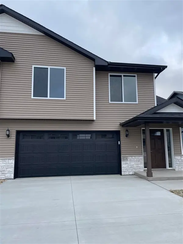 856 Armands Ln, Tiffin, IA 52340