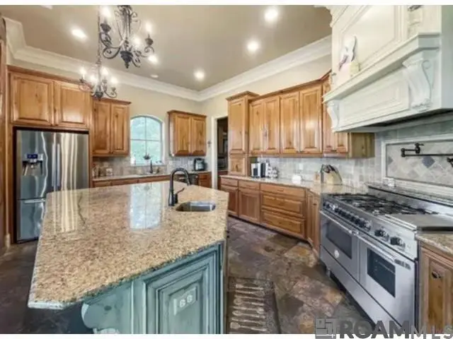 8979 Carriagewood Estates Dr, St. George, LA 70817 - #1