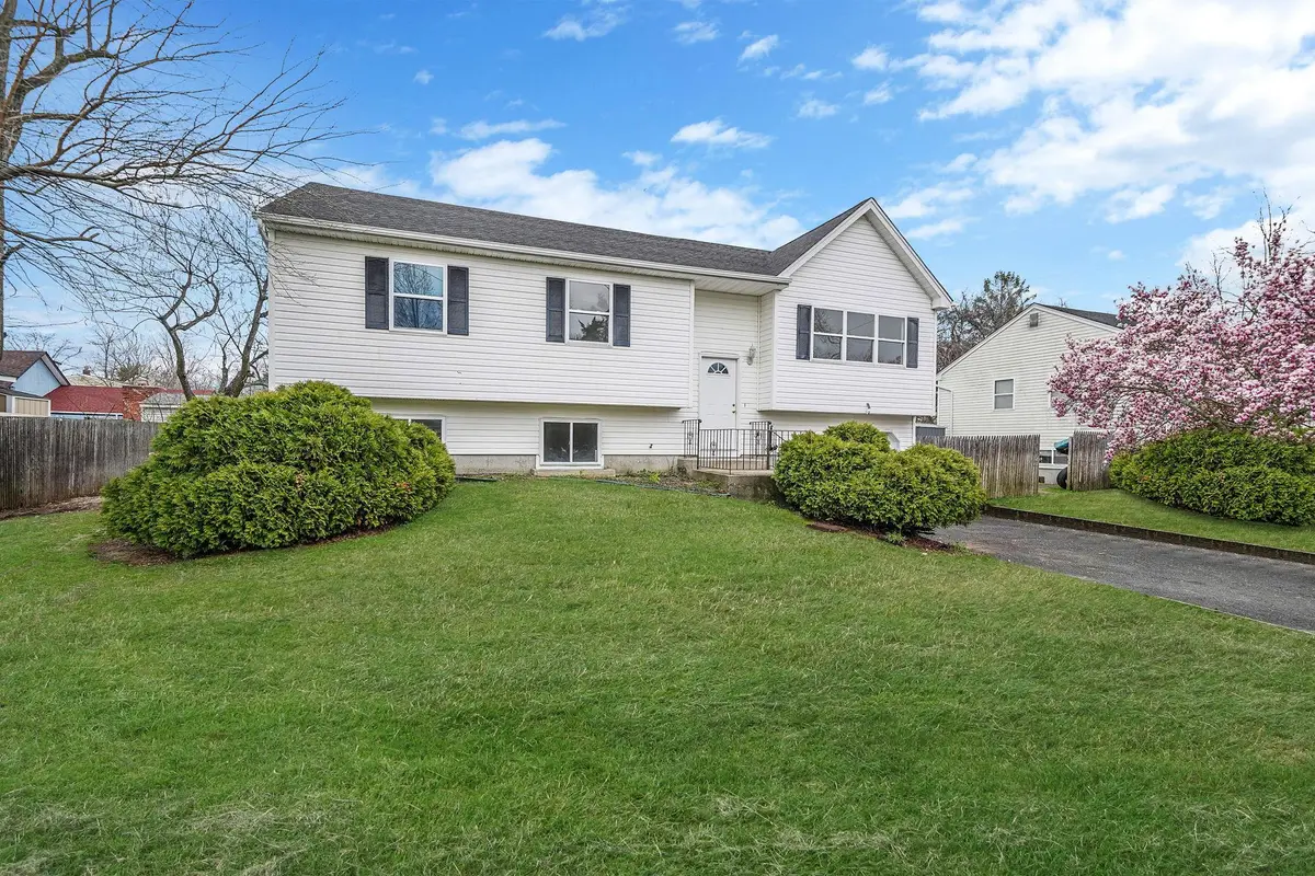 55 Woodycrest Avenue, Farmingville, NY 11738 - Image #1