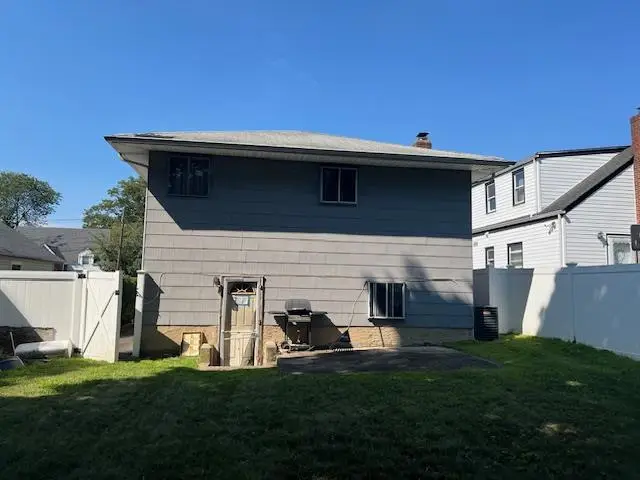 87 W Clinton Avenue, Roosevelt, NY 11575 - Image #1