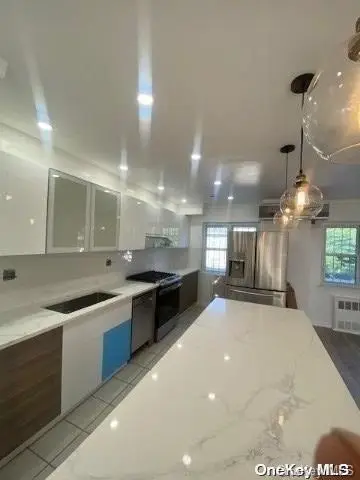 48-42 58th Lane, Woodside, NY 11377