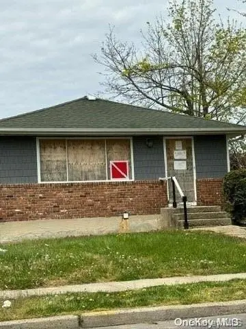 19 Bennett Avenue, Roosevelt, NY 11575 - Image #1