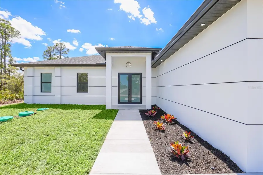 1124 S Edelweiss Street E, Lehigh Acres, FL 33974 - #3