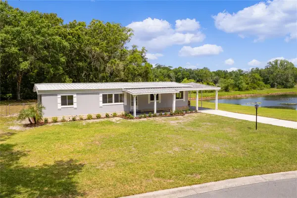 302 Ivanhoe Circle, LADY LAKE, FL 32159