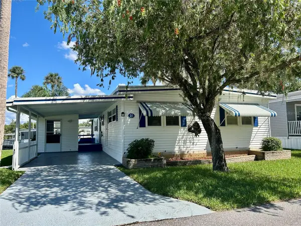 33 Cocos Plumosa Drive, EUSTIS, FL 32726