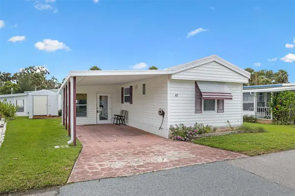 47 Cocos Plumosa Drive, EUSTIS, FL 32726