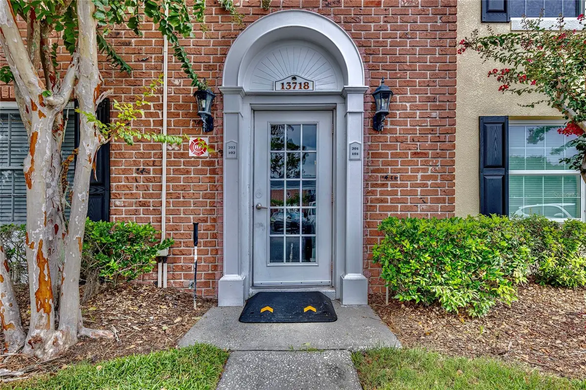 13718 Orange Sunset Drive #202, Tampa, FL 33618 - Image #1