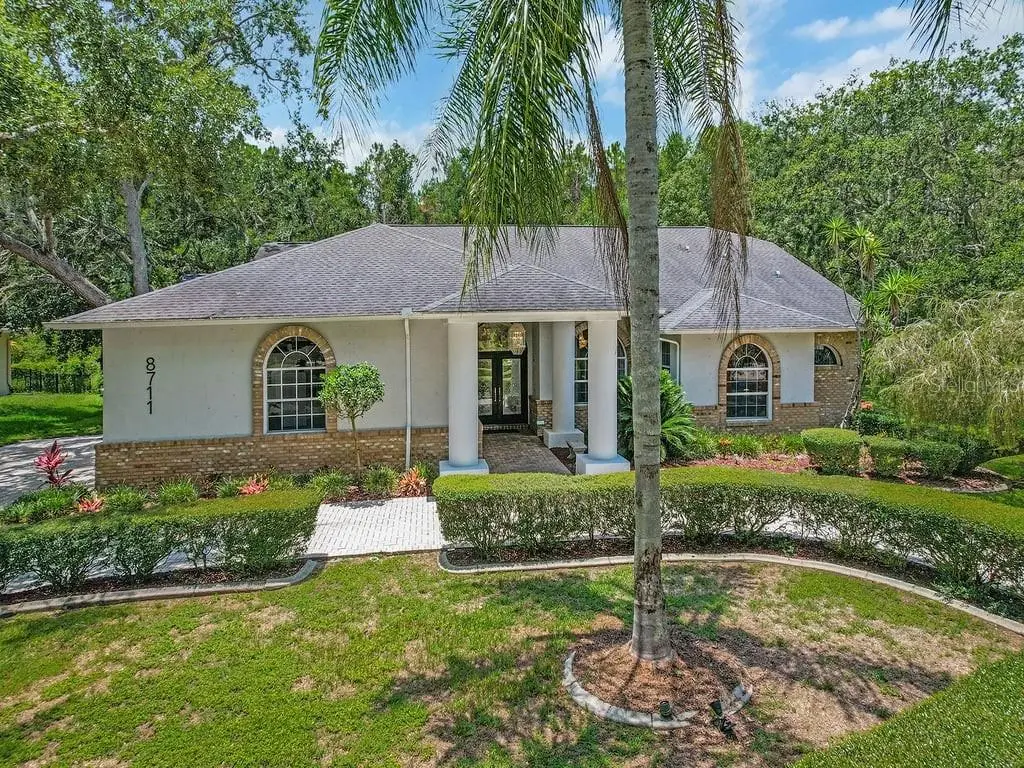 8711 Crescent Forest Boulevard, New Port Richey, FL 34654 - Image #1