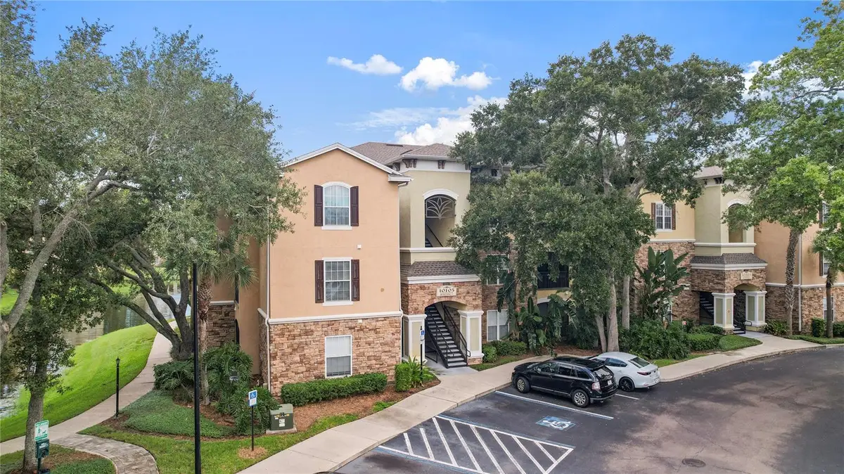 10105 Courtney Oaks Circle #203, Tampa, FL 33619 - #1