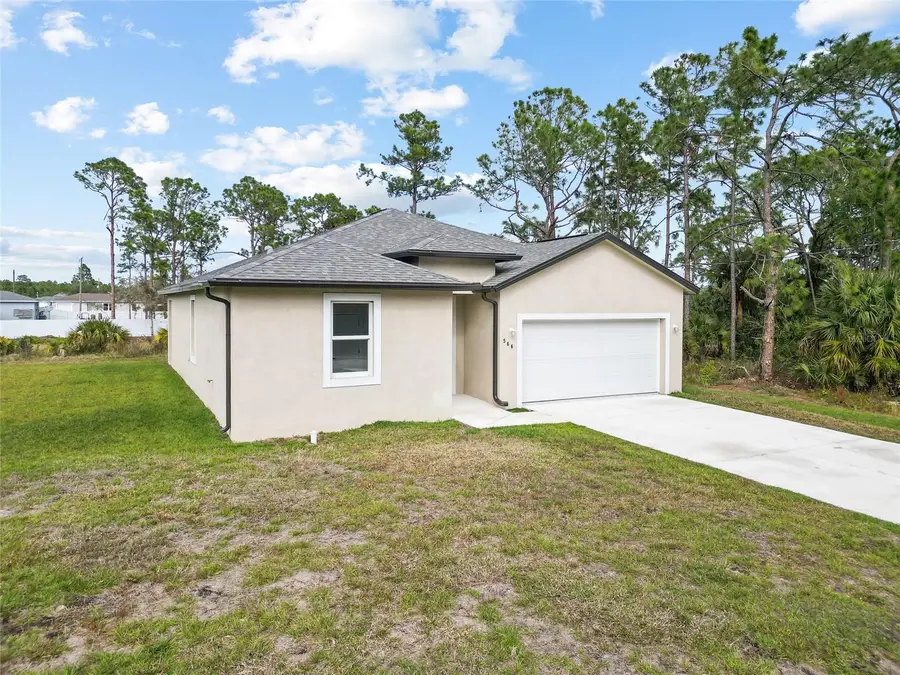 566 Woodview Dr, Lehigh Acres, FL 33972 - #2