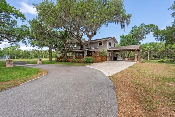 800 Hidden Oaks Lane, OAK HILL, FL 32759