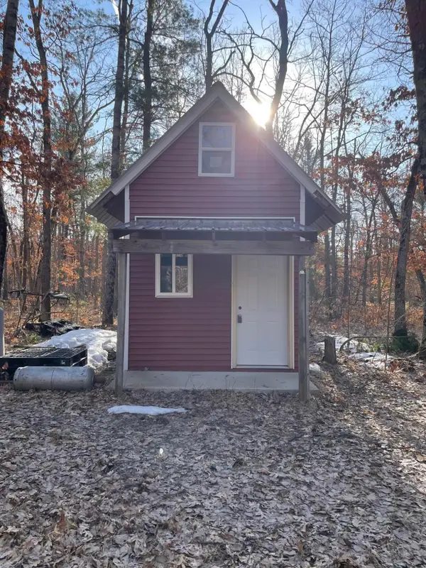 21210 W 12 Mile Road, Irons, MI 49644