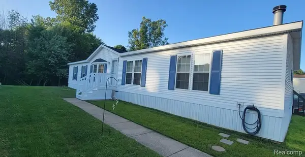 443 Pond View Drive E, Morrice, MI 48857