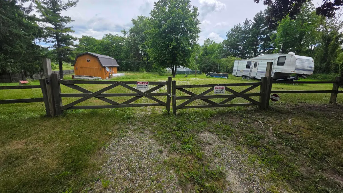 6591 S Tripp RD, Osseo, MI 49266 - #1