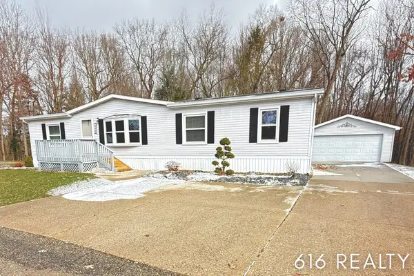 7358 Willow Wood Drive NE, Belmont, MI 49306