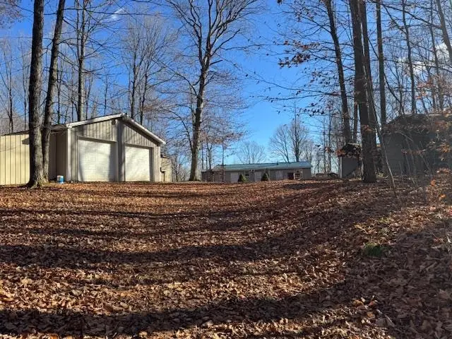 10242 N 7 Mile, Norwich, MI 49651 - Image #1