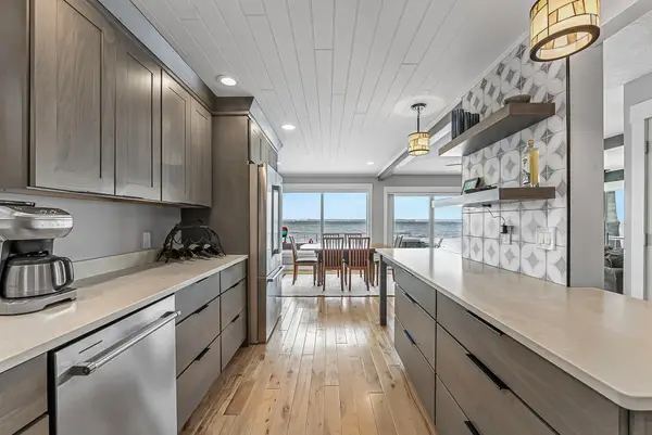 5648 MacKenzie DR, Kewadin, MI 49648