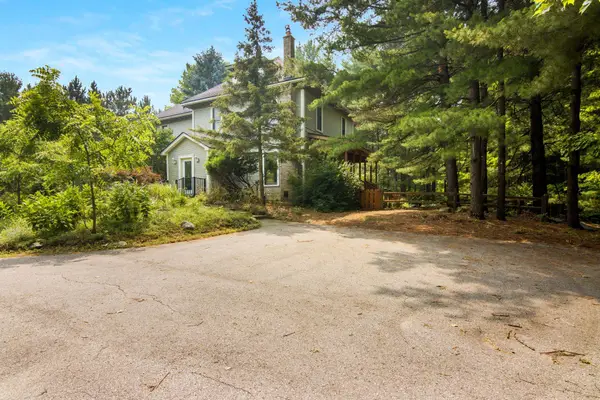 7651 Timberwoods, TraverseCity, MI 49684