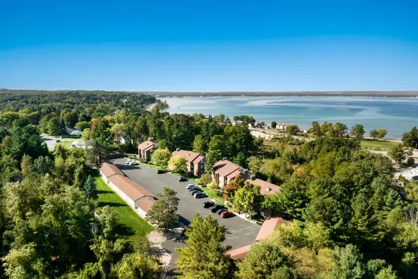 5883 Andorra DR, Williamsburg, MI 49690
