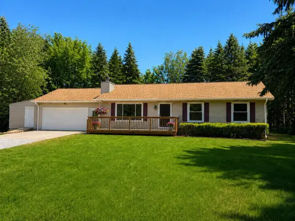 1401 Ryans Pond, Grawn, MI 49637