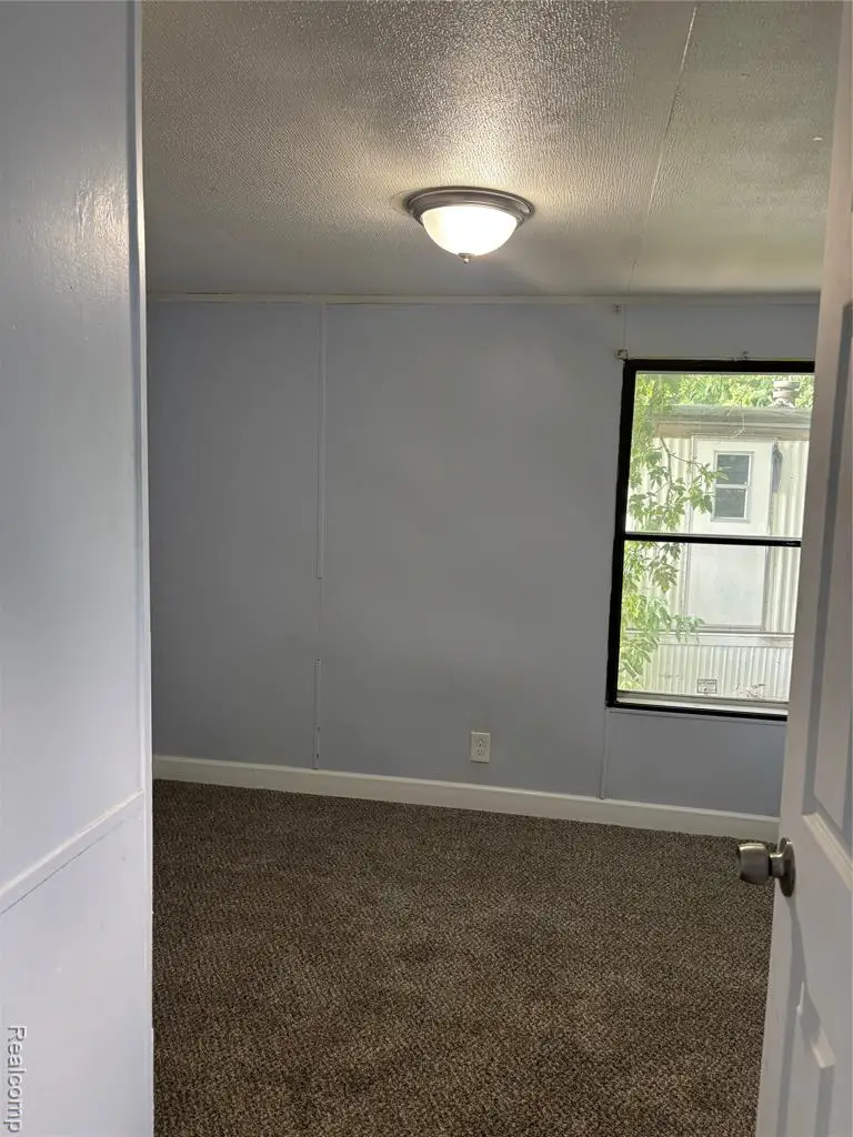 4493 Fenton Rd Lot 9, Burton, MI 48529 - Image #3