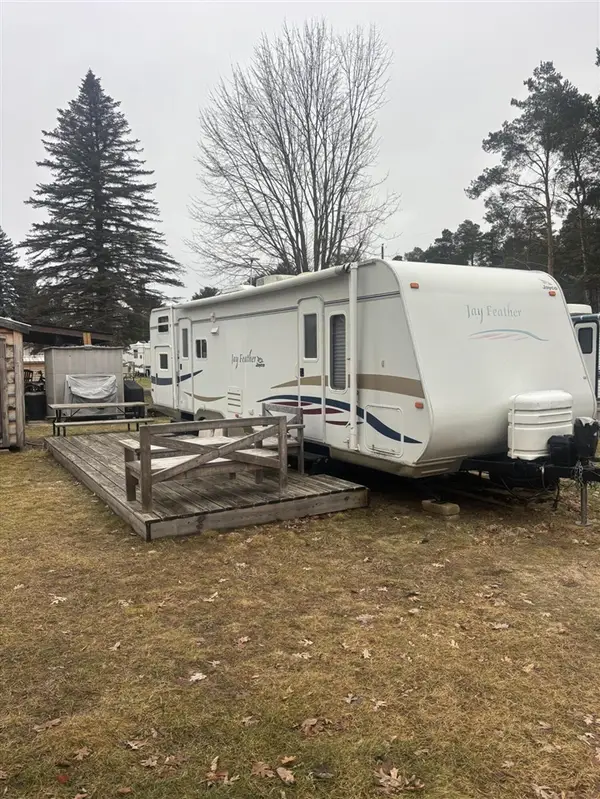 9806 Golf Port, Canadian Lakes, MI 49346