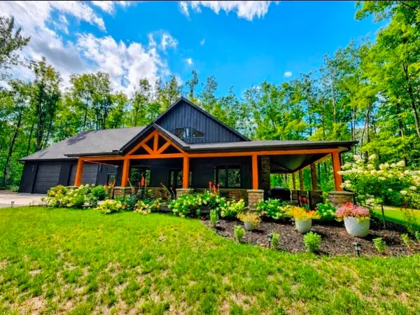 7020 Woodridge, Mancelona, MI 49659