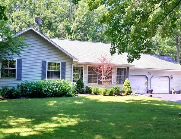 8124 Fairway Hollow Drive, Mancelona, MI 49659