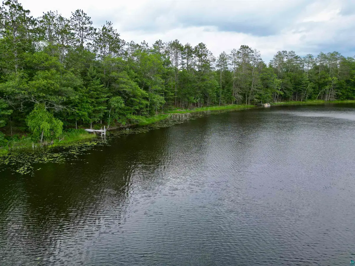 7621 N White Beach Rd, Bass Lake, WI 54834 - Image #1