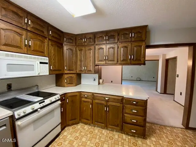 212 4th Street Nw, Beulah, ND 58523 - #3