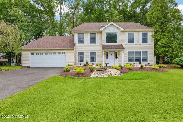 25 Winding Woods Way, Manalapan, NJ 07726