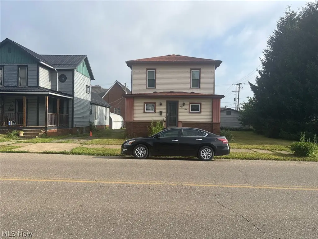 309 E 1st Street, Uhrichsville, OH 44683 - #1