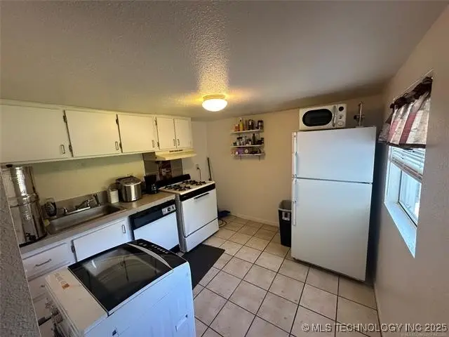 907 N Wilson Avenue, Sand Springs, OK 74063 - #3