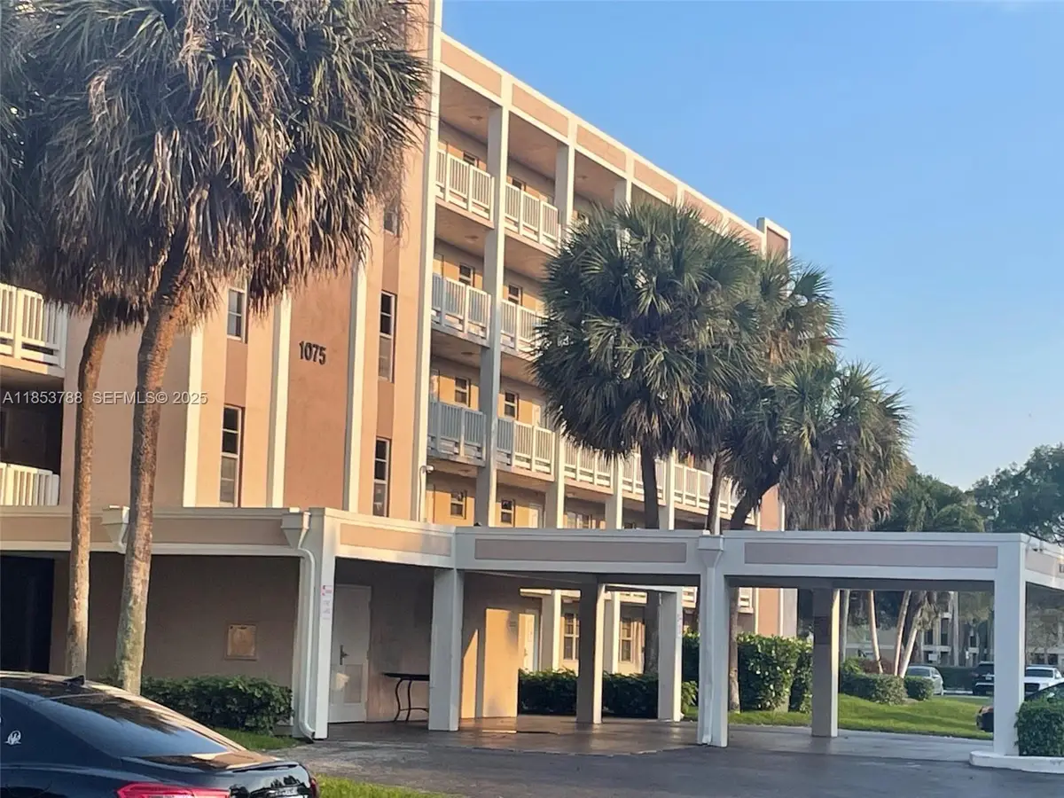 1075 Riverside Drive #203, Coral Springs, FL 33071 - #1