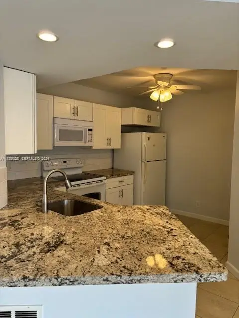 8977 Wiles Road #103, Coral Springs, FL 33067 - #1