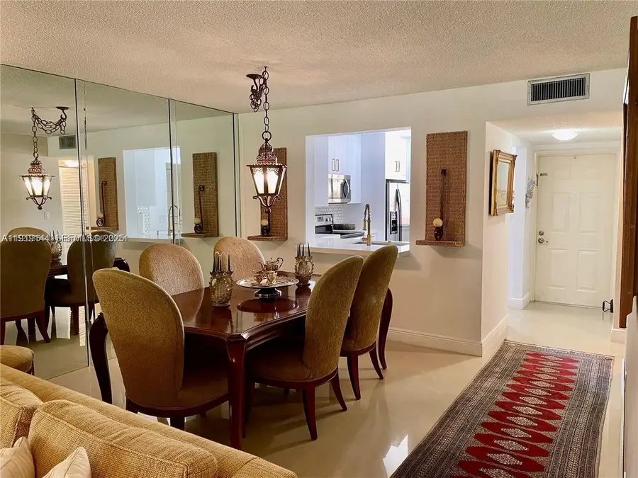 8592 W Sunrise Boulevard #111, Plantation, FL 33322 - #2