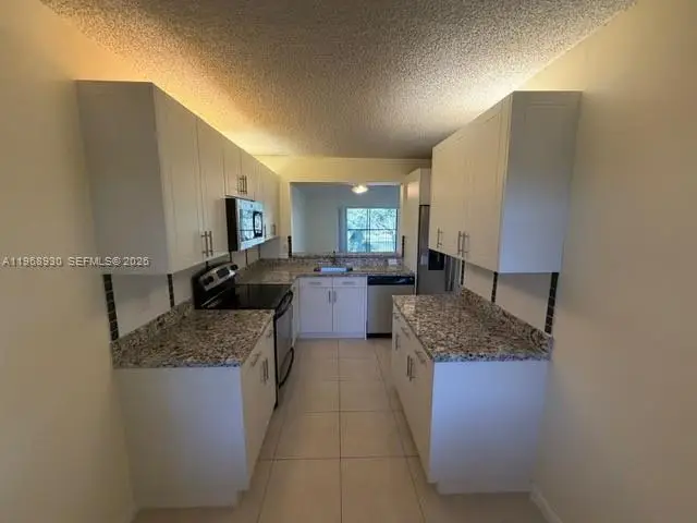 2071 Coral Ridge Drive #N204, Coral Springs, FL 33071 - #2