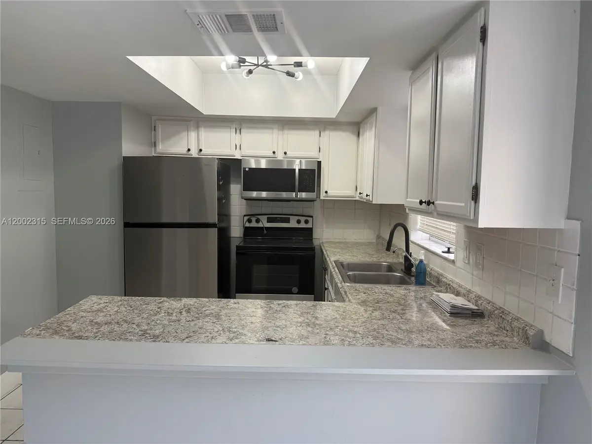 7926 Kimberly Boulevard #202, North Lauderdale, FL 33068 - #1