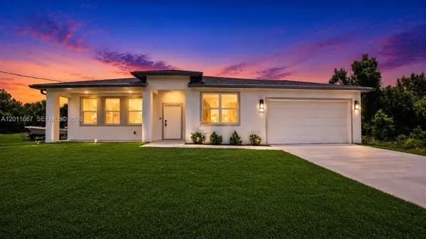 1909 Moore Avenue, Lehigh Acres, FL 33972