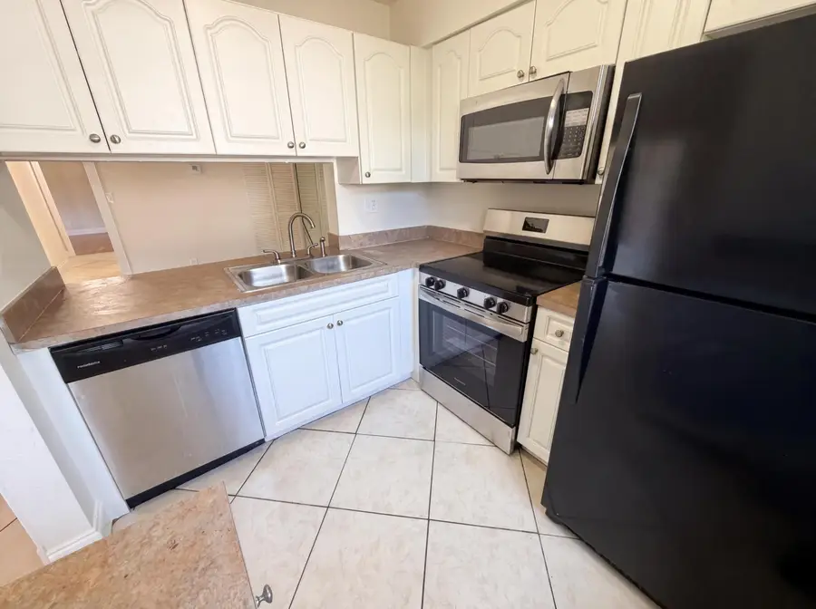 2737 S Oakland Forest Drive #202, Oakland Park, FL 33309 - #2