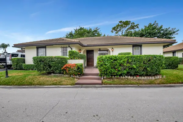 428 Pine Villa Drive, Atlantis, FL 33462