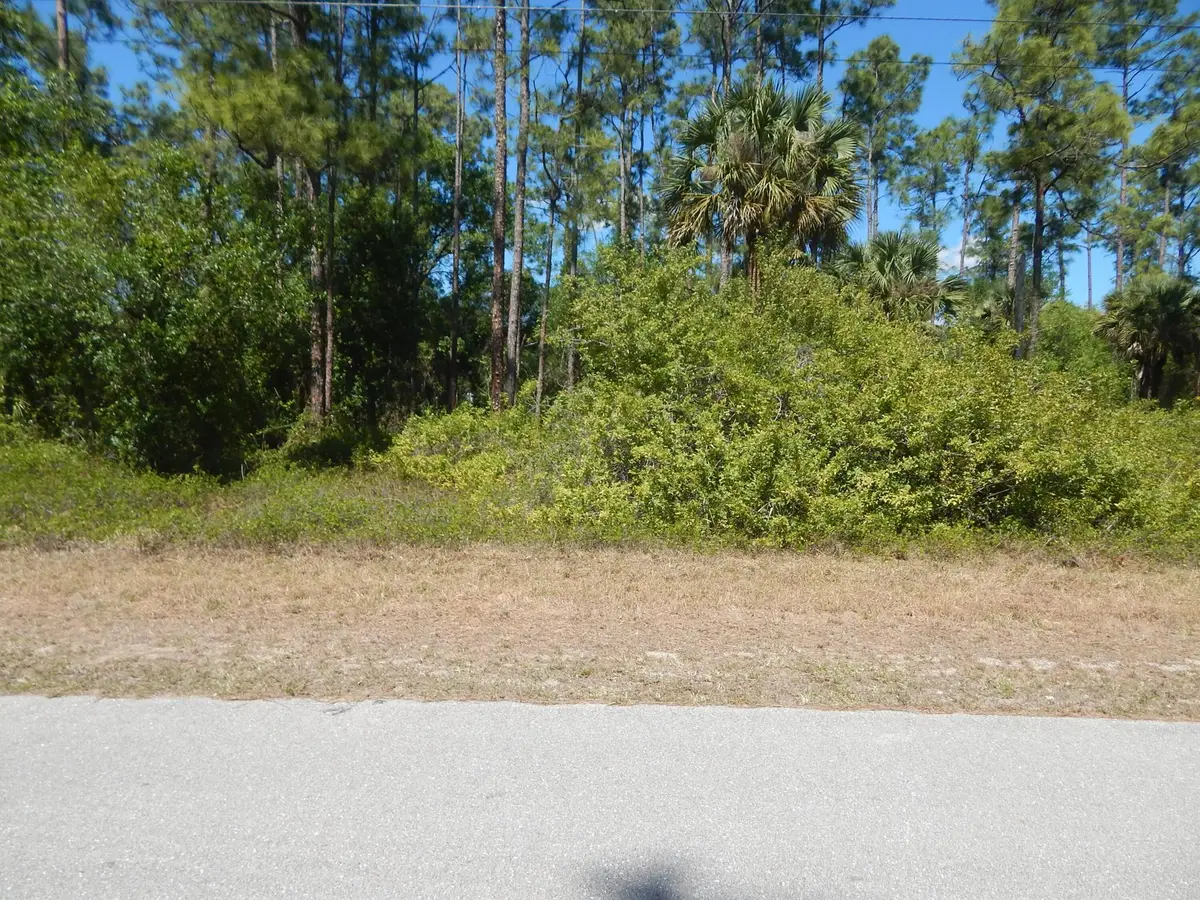 1047 Asther Street E, Lehigh Acres, FL 33974 - Image #1