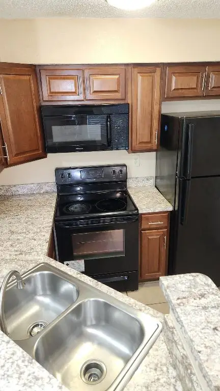 8636 Mallard Reserve Drive #102, Tampa, FL 33614 - Image #1